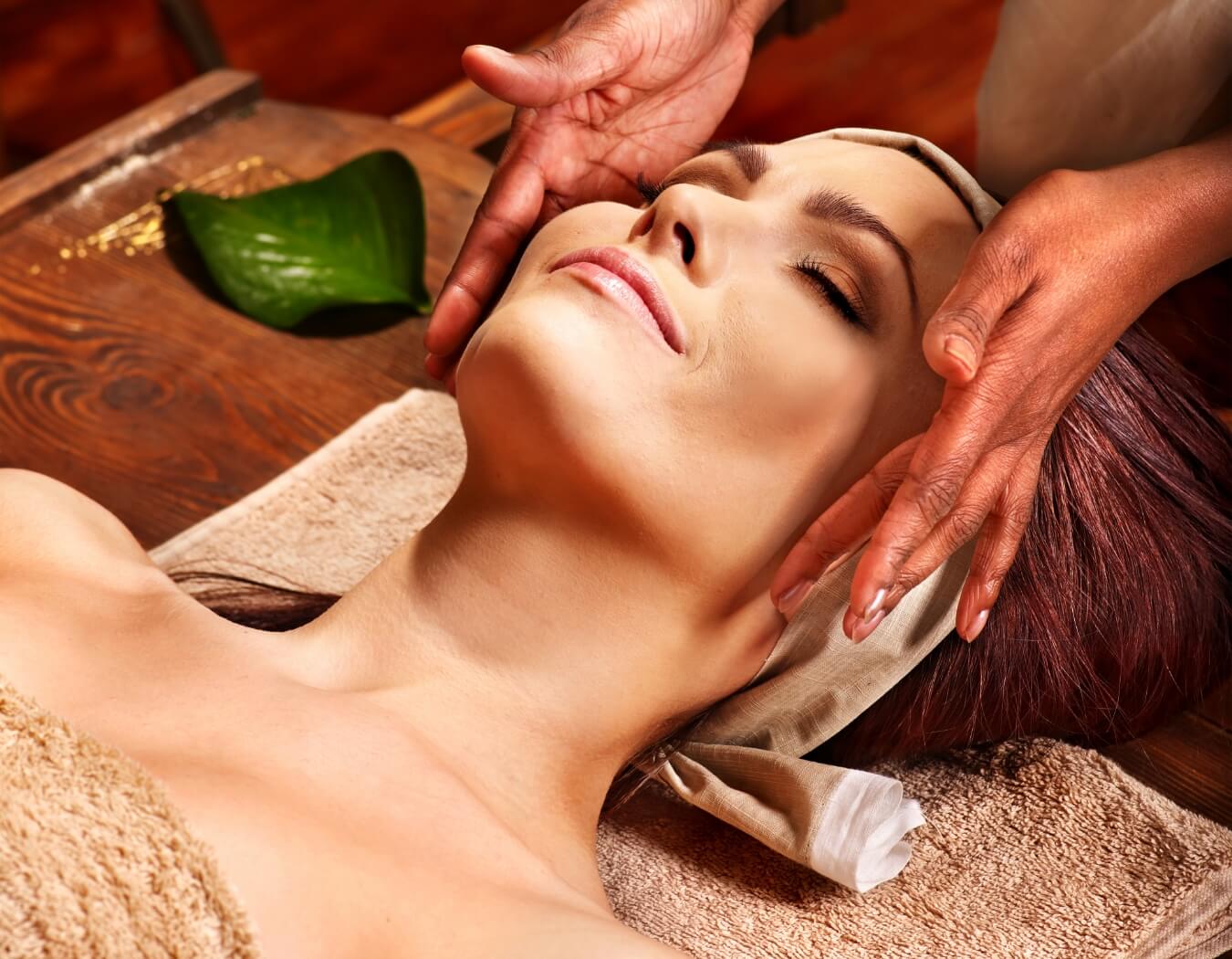 A woman enjoying her spa package.